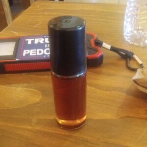 Amber Roller Bottle with Black Cap